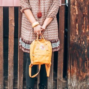 Fjällräven kånken yellow backpack